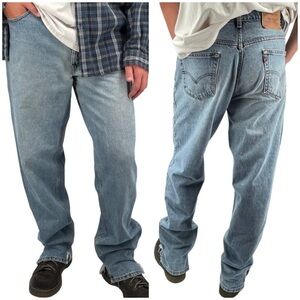 Vintage 90s Levi's 560 Jeans Baggy Fit Light Wash Blue 100% Cotton | 34" x 36"